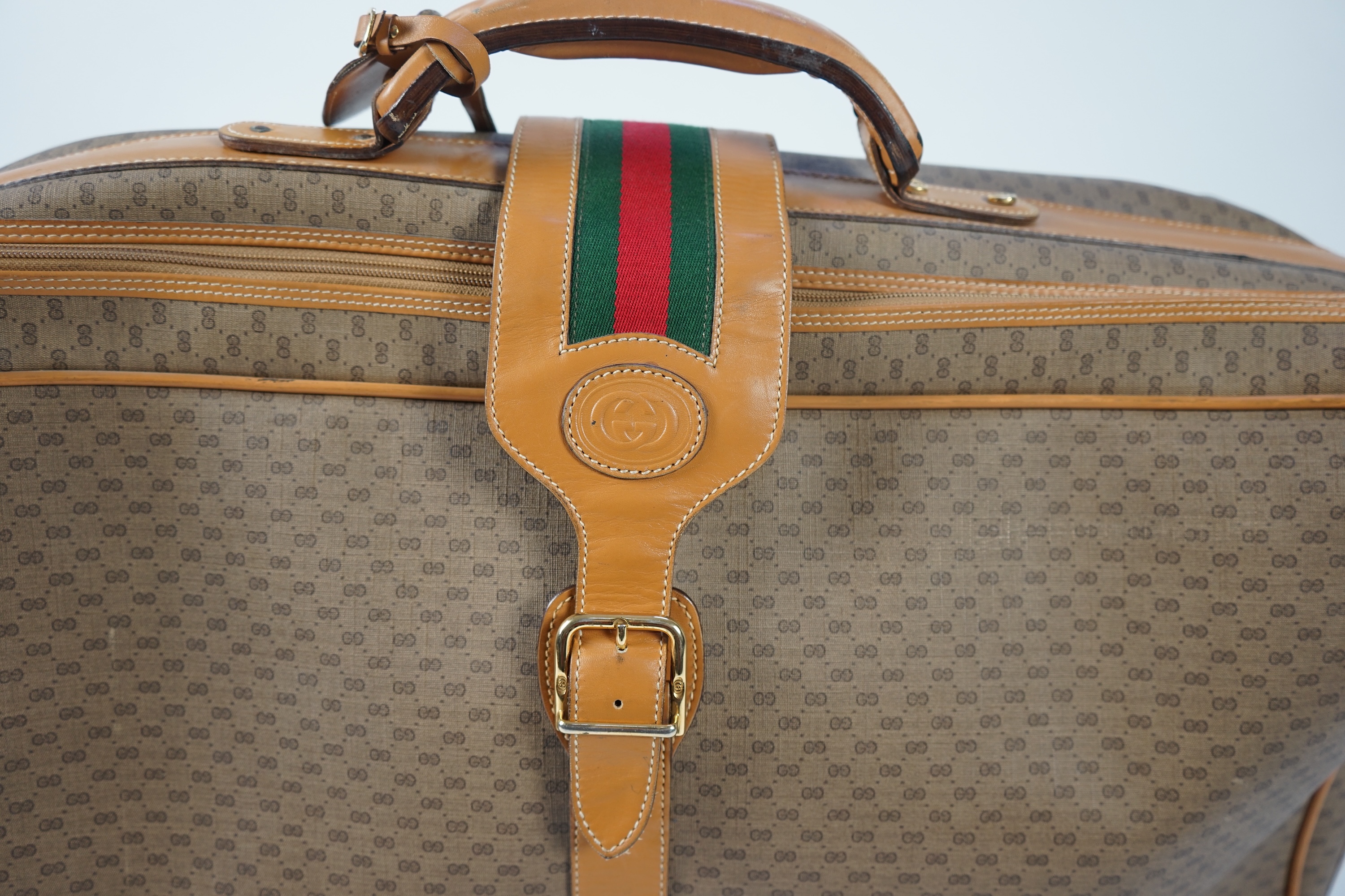 A vintage Gucci micro GG monogram canvas suitcase